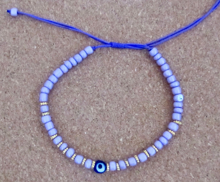 Purple Cord Evil Eye Bracelet: Adjustable Beaded Protection Jewellery